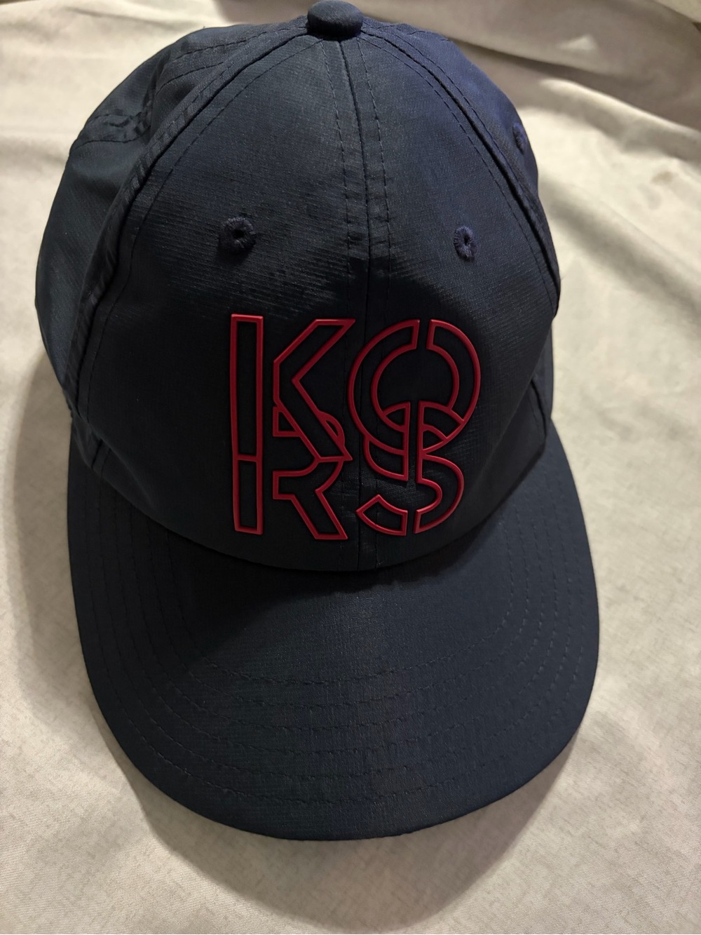 Michael Kors Navy Baseball Cap with Red Logo